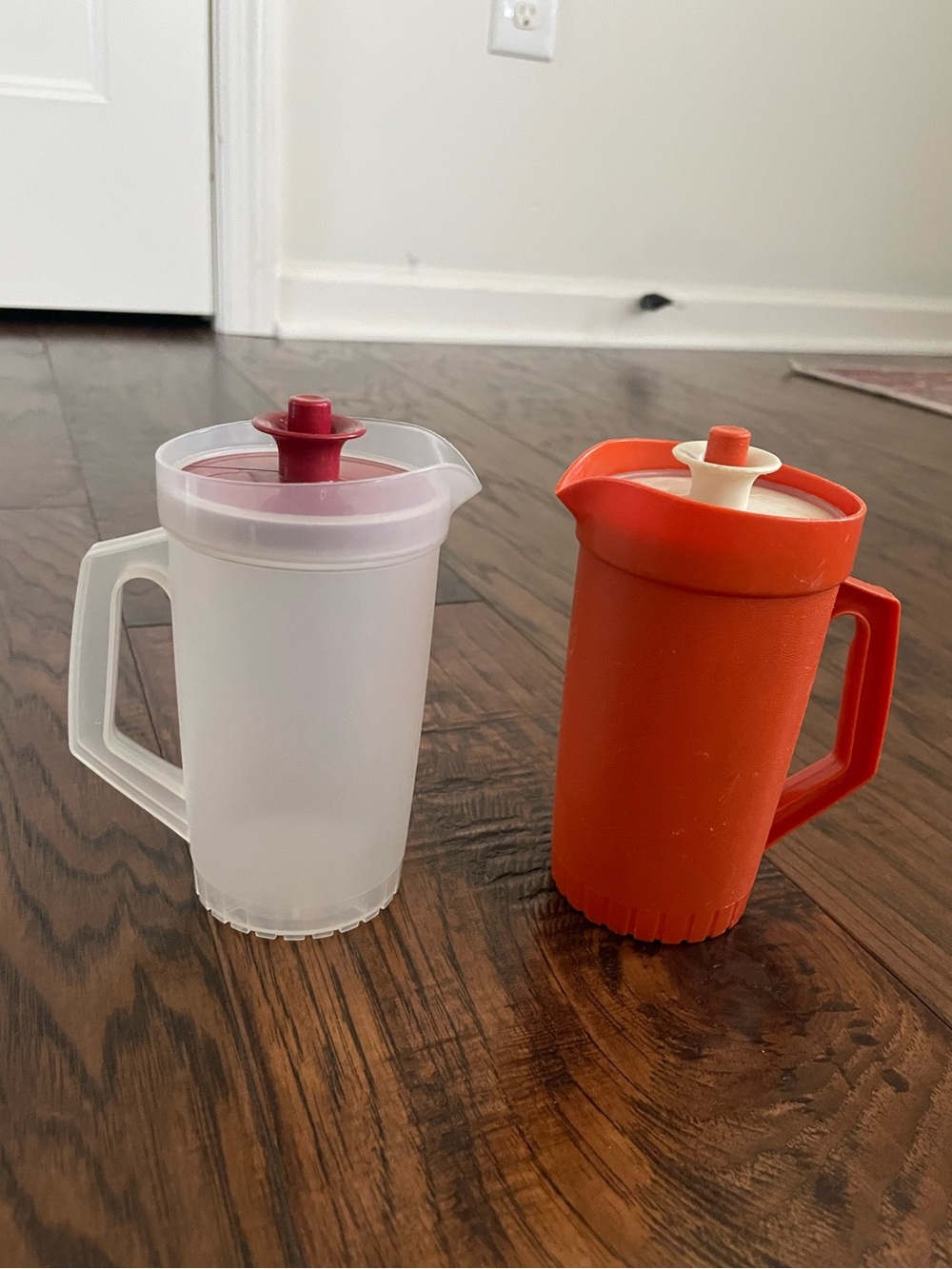 Pair of Plastic Mini Tupperware Pitchers with Lids Frosted White & Bright Orange
